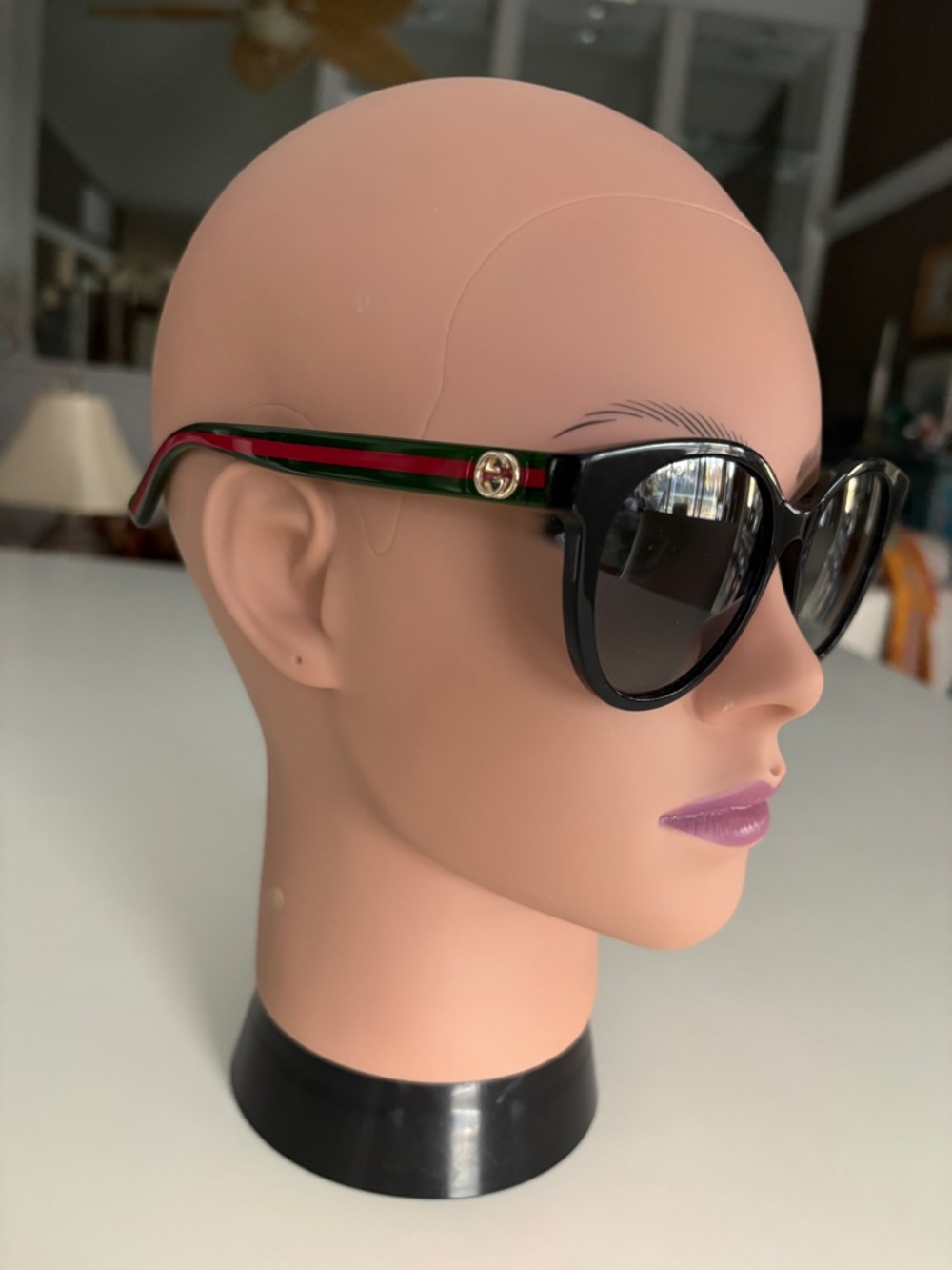 Gucci Black Cat-Eye Sunglasses with Red and Green Temples